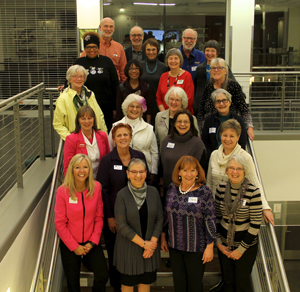 King County Library System staff, AARP staff and volunteers, and well-known librarian, author, and library critic Nancy Pearl celebrate the success of new programming for library guests age 50 and older.