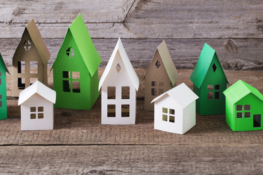 paper house on wooden background