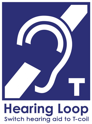 International symbol for assisted listening system has a blue background with a white ear and white diagonal stripe. A small letter T in the corner indicates that this system includes a hearing loop. Text reads Hearing Loop - Switch hearing aid to T-coil.