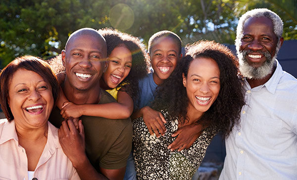 multi-generational family posing for a group photo