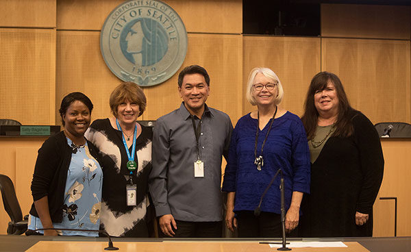 Lena Tebeau, Cathy Knight, G De Castro, Sally Bagshaw, and Cathy MacCaul following the lunch-and-learn on The Affordability of Long-Term Care in the Seattle City Council Chamber