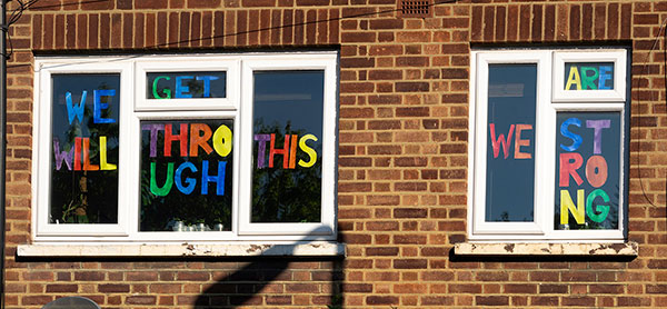 banners showing thorugh exterior windows of a house