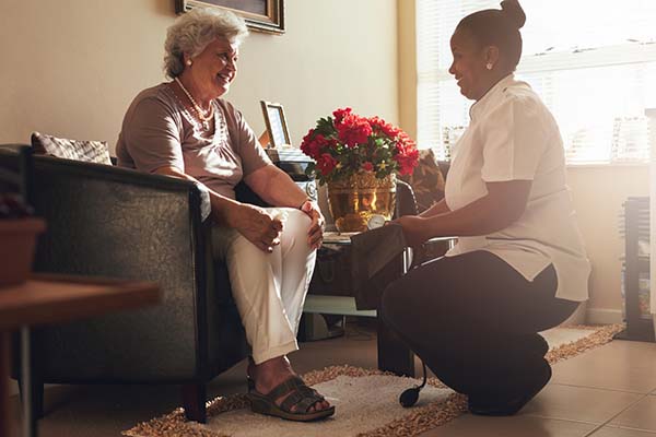 caregiver talking with homecare client