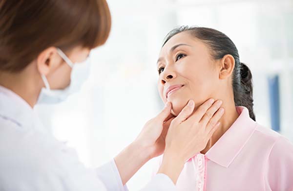 woman being examined by a doctor