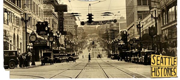 an old photo of a street in Seattle