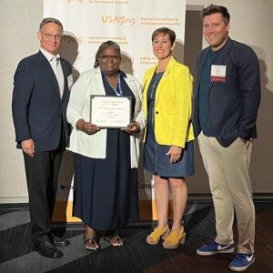 ADS director Mary Mitchell received a 2023 Aging Achievement Award at the USAging conference in July 2023.