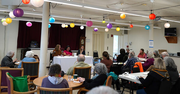 Many seniors sit and listen to a panel of three women speak at Age Friendly Seattle’s Civic Coffee on February 23, 2024.