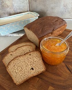 high protein bread with jar of marmalade on a counter