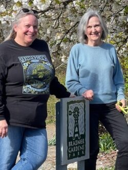 Pamela Willams and Joyce Moty pose for a photo at the Bradner Gardens P-Patch.